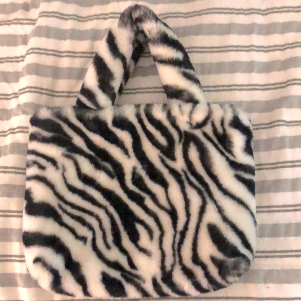 Zebra faux fur purse